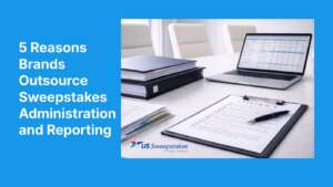 Modern office desk with contract documents, binders, and a laptop displaying reports, representing outsourcing sweepstakes administration and reporting for brands.