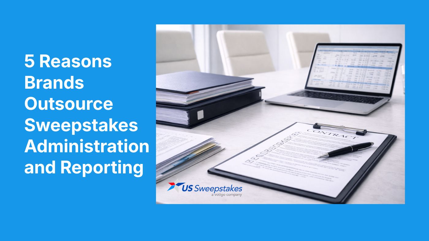 Modern office desk with contract documents, binders, and a laptop displaying reports, representing outsourcing sweepstakes administration and reporting for brands.