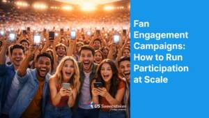 Large crowd of fans holding up smartphones in a stadium, representing fan engagement campaigns at scale.