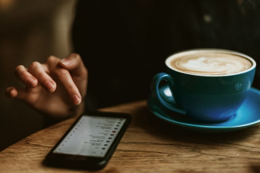 Customer entering mobile sweepstakes via SMS text-to-win campaign on smartphone