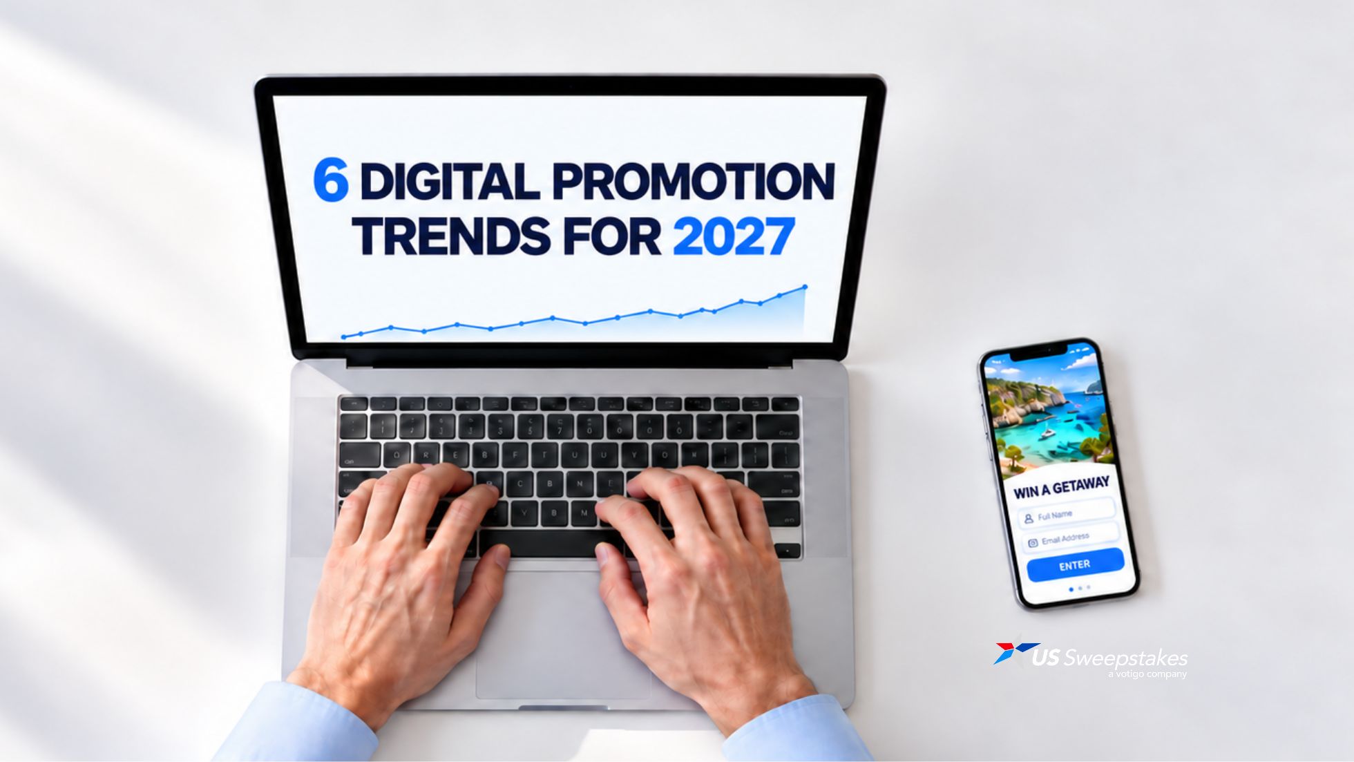 Overhead view of a marketer planning 2027 digital promotions, with promotion trends on a laptop and a sweepstakes entry form on a smartphone.